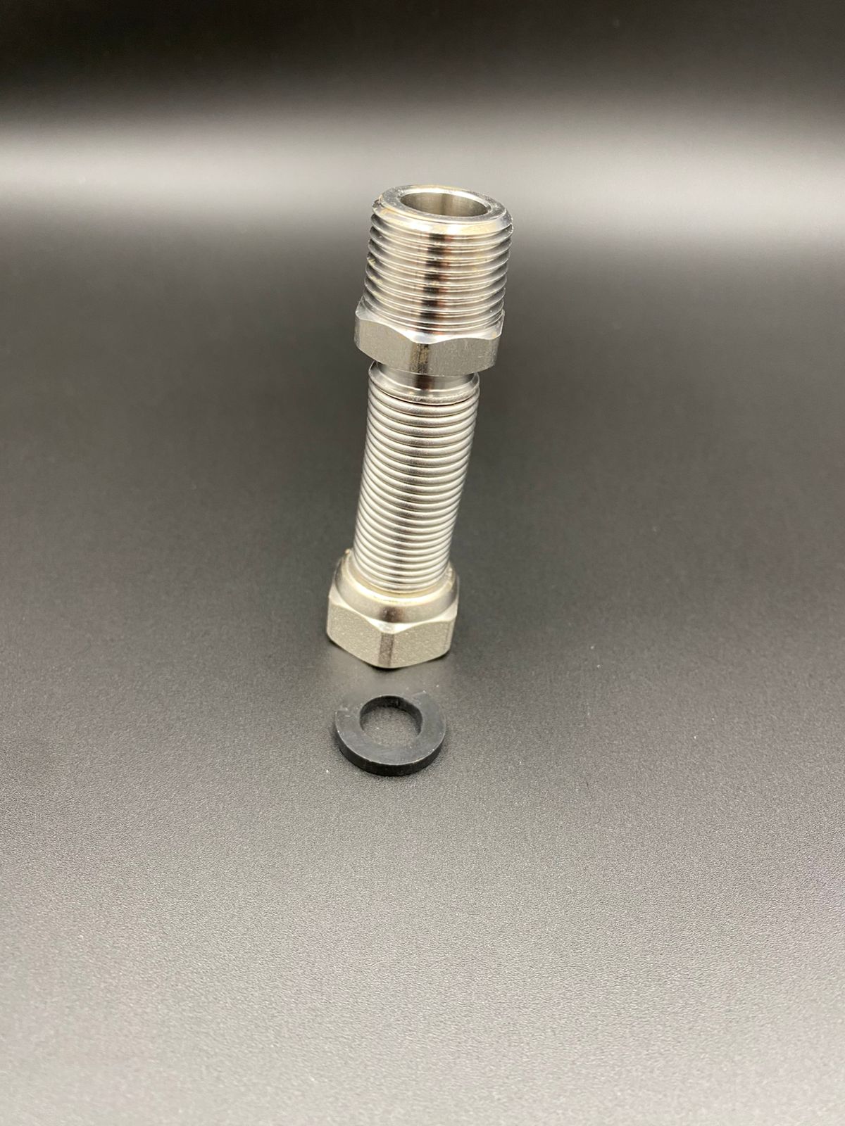 Подводка редукционная 1/2" г/ш (65-125 мм)из нержавеющей стали сильфонного типа, арт.C-H65-022MF